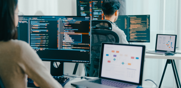 Developers Coding on Their PCs