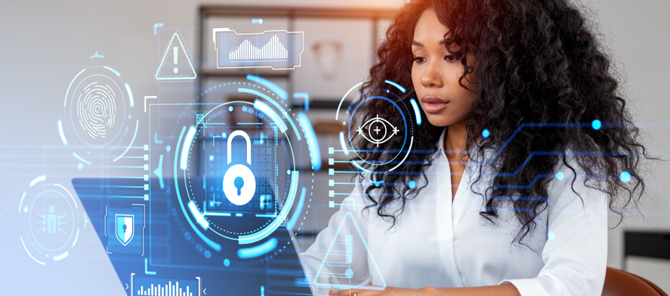 Woman working on laptop, managing platform security.