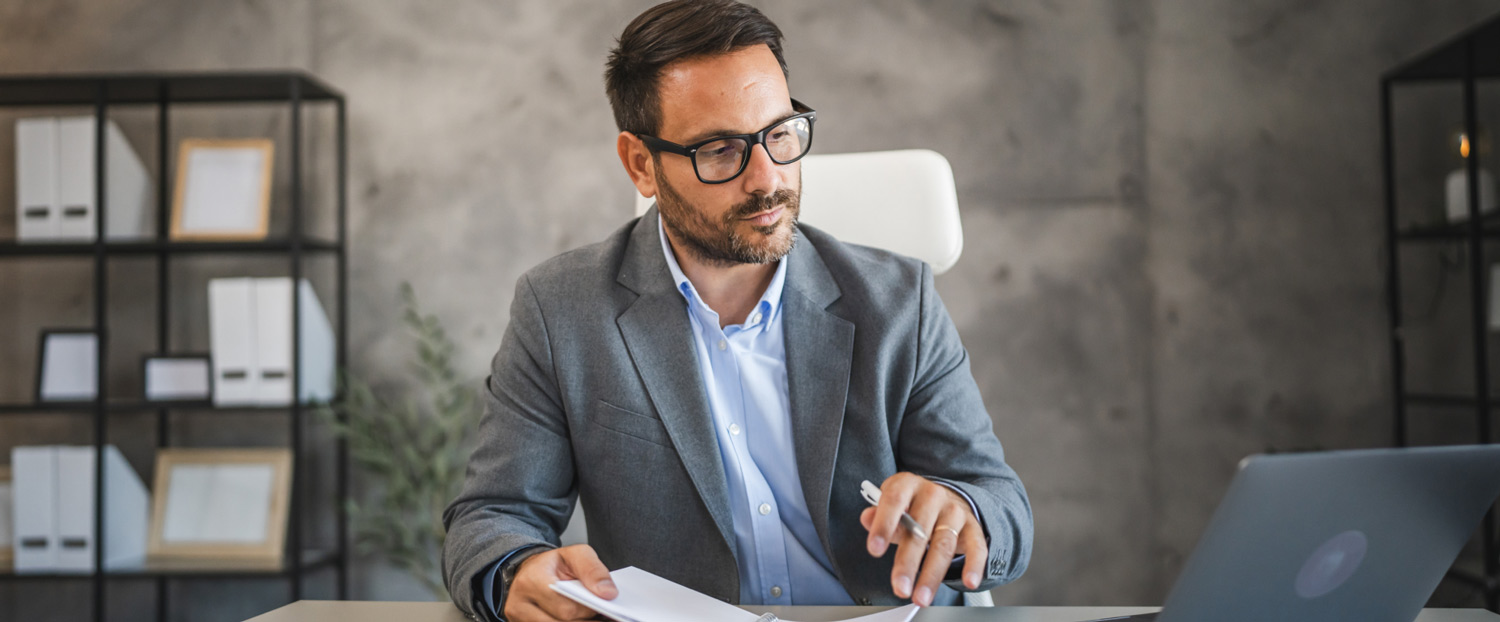 Man evaluating data on computer