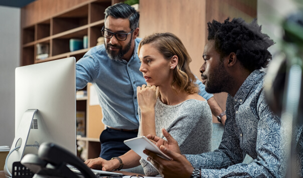 Team evaluating financial threats with AI fraud detection